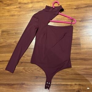 Dynamite One-Shoulder Long Sleeve Bodysuit in Deep Burgundy